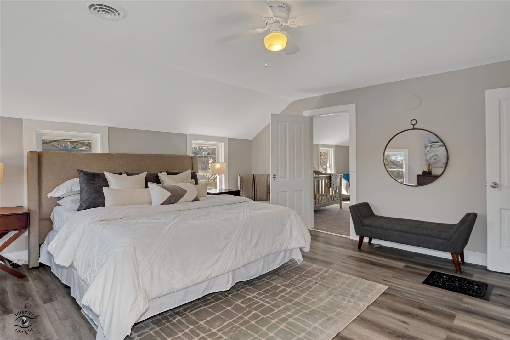 714 Gould Street Beecher, IL 60401 - Photo 23 of 29 a bedroom with bed and a chandelier