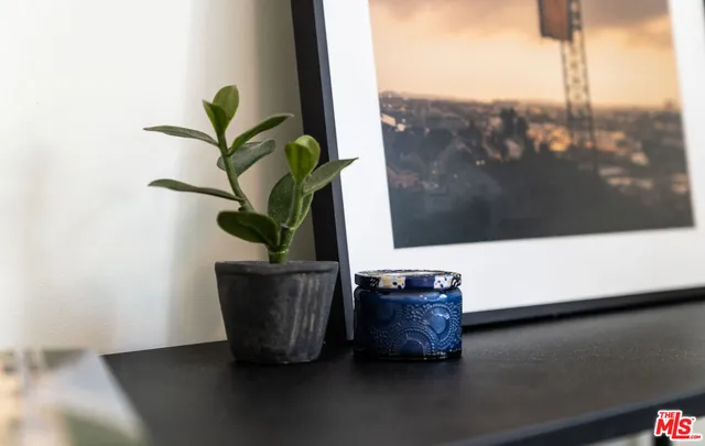a bedroom with double bed and a window