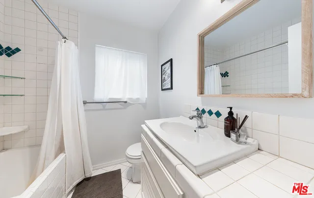 a view of a living room with furniture