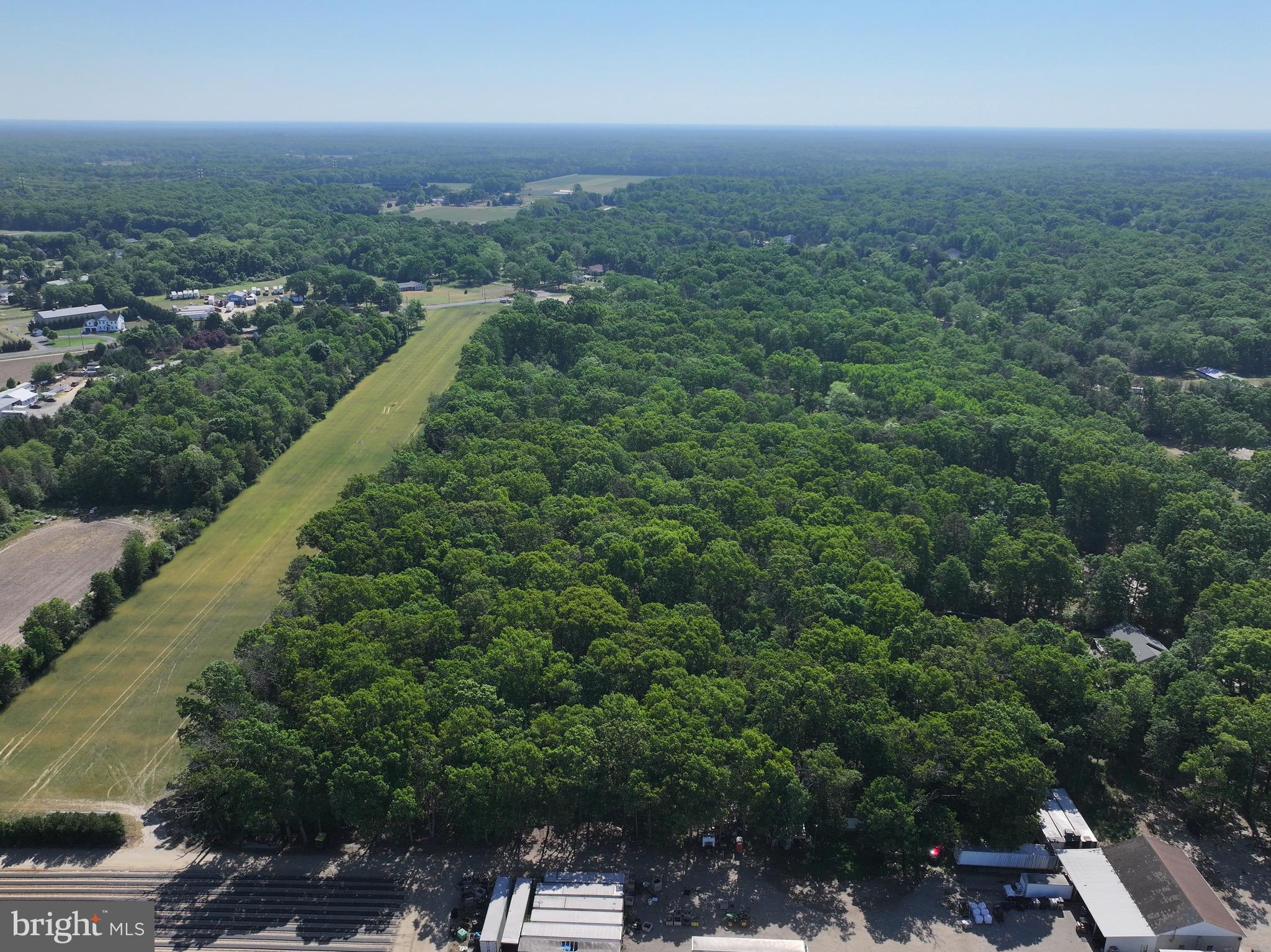 Tuckahoe Road Vineland, NJ 08360 - Photo 5 of 5 a view of a city with lush green forest