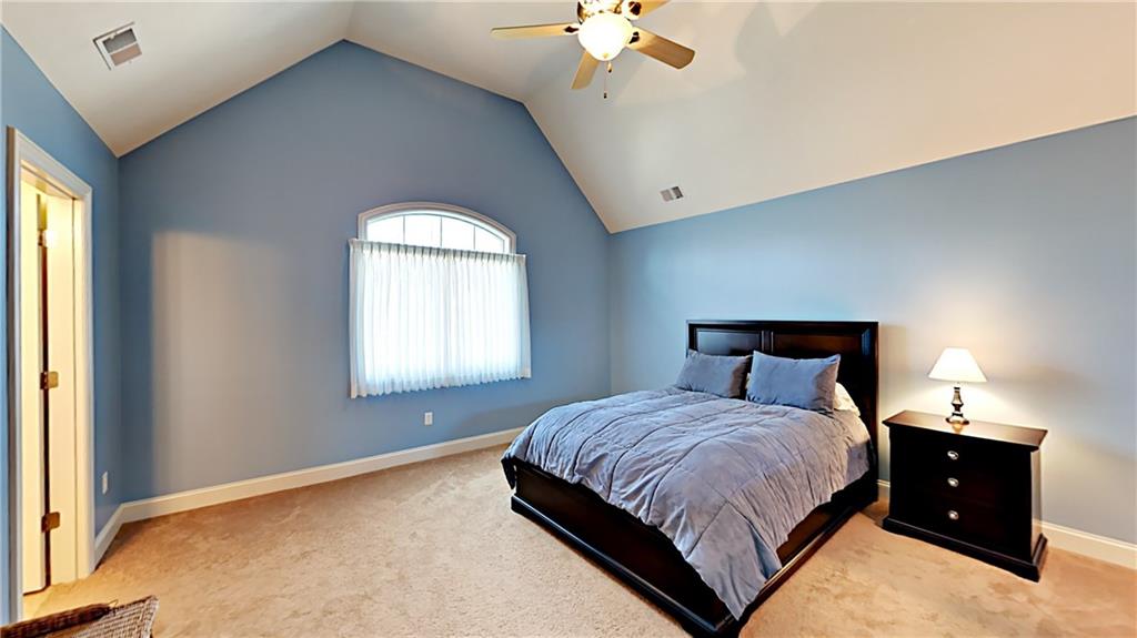 811 Mt Pleasant Road Mars, PA 16046 - Photo 14 of 25 a bedroom with a bed and a chandelier