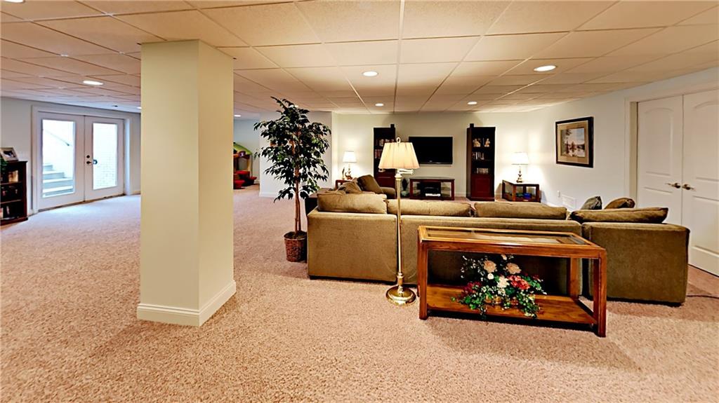 811 Mt Pleasant Road Mars, PA 16046 - Photo 21 of 25 a living room with furniture and a potted plant