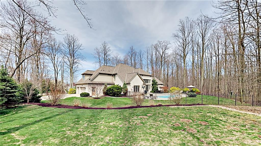 811 Mt Pleasant Road Mars, PA 16046 - Photo 24 of 25 a front view of a house with garden
