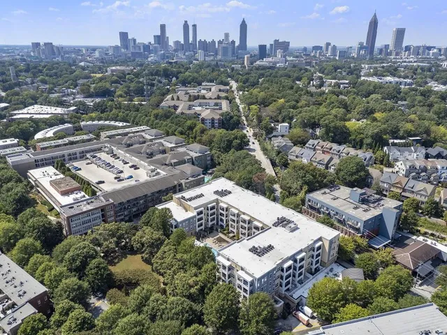 an aerial view of a city with lots of residential buildings