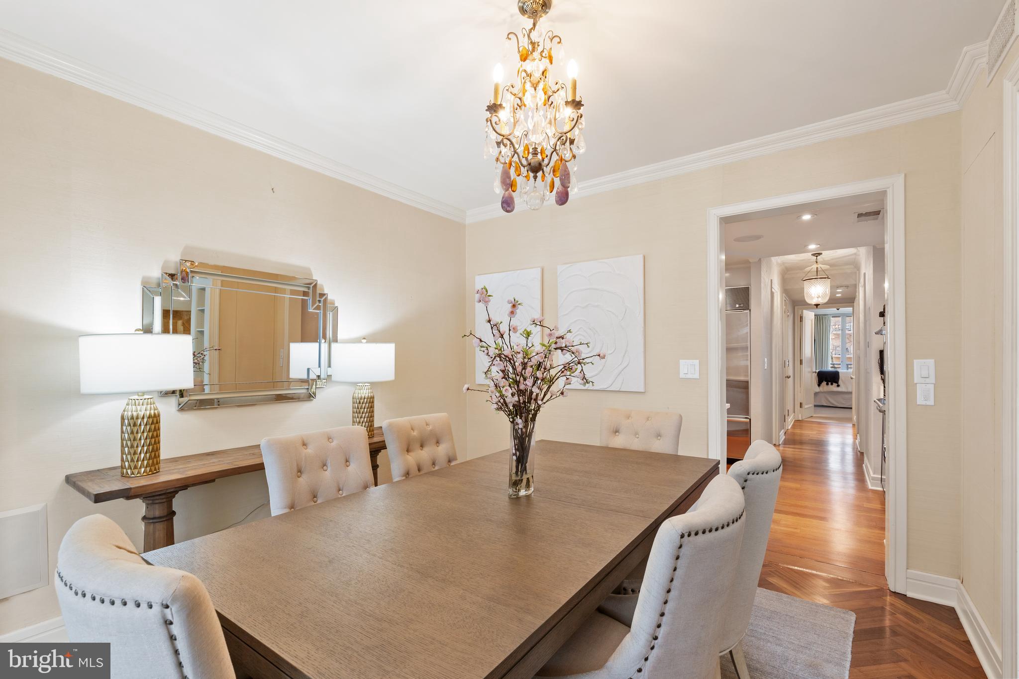 1111 23rd Street Northwest, Unit 4C Washington, DC 20037 - Photo 18 of 39 a view of a dining room with furniture and wooden floor