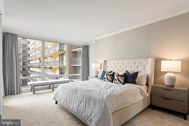 a bedroom with a large bed and furniture