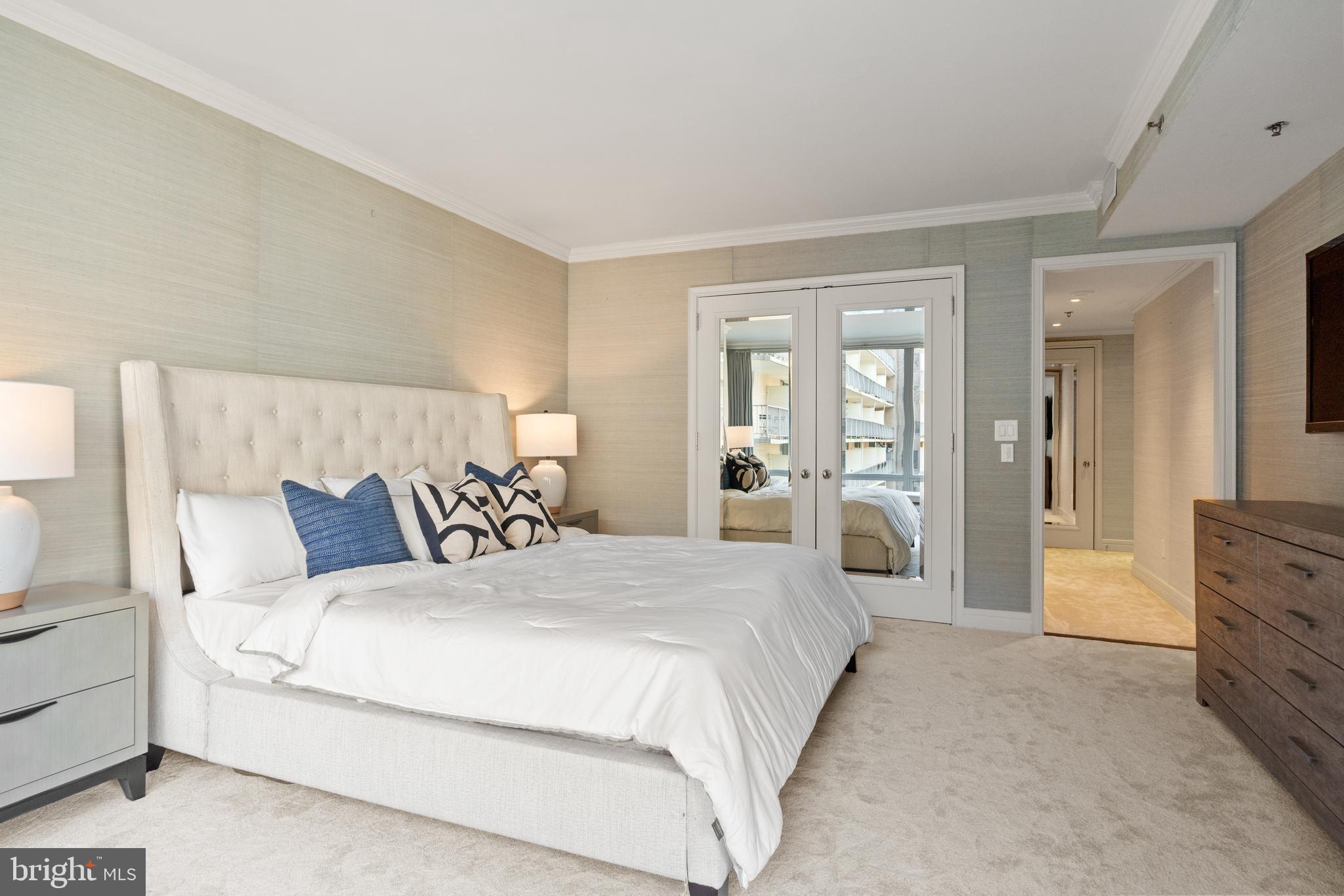 1111 23rd Street Northwest, Unit 4C Washington, DC 20037 - Photo 23 of 39 a bedroom with a large bed and furniture