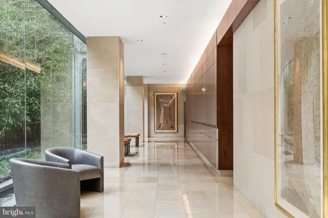 a view of livingroom with furniture and windows