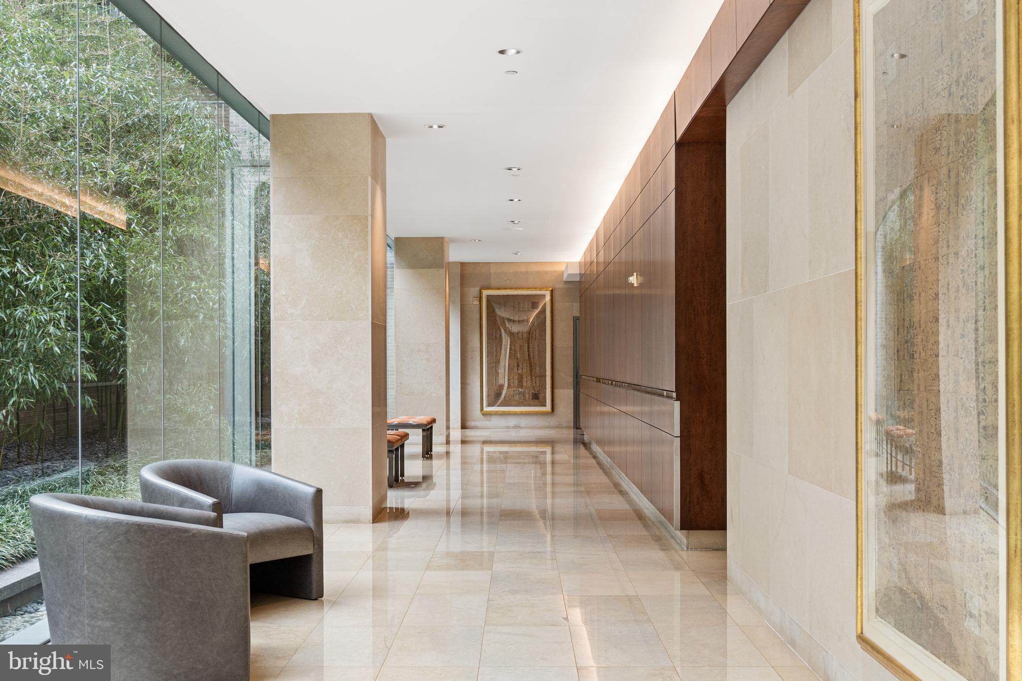 1111 23rd Street Northwest, Unit 4C Washington, DC 20037 - Photo 3 of 39 a view of livingroom with furniture and windows