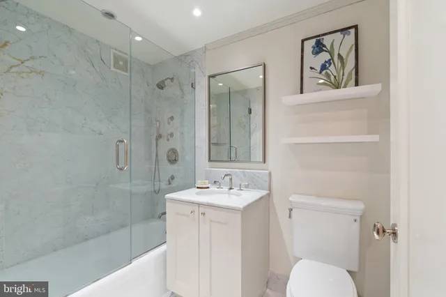 a view of a hallway with washer and dryer