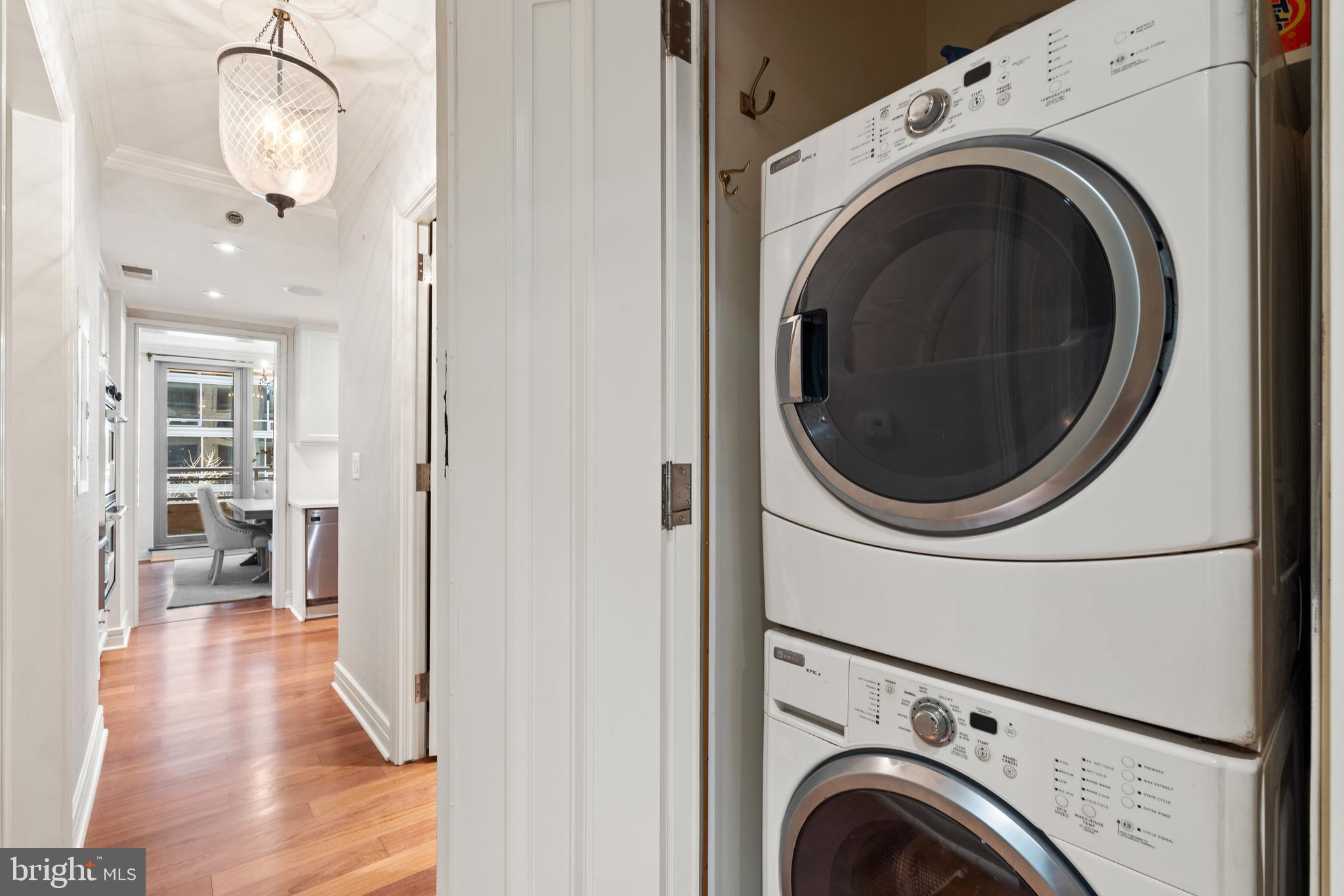 1111 23rd Street Northwest, Unit 4C Washington, DC 20037 - Photo 34 of 39 a view of a hallway with washer and dryer