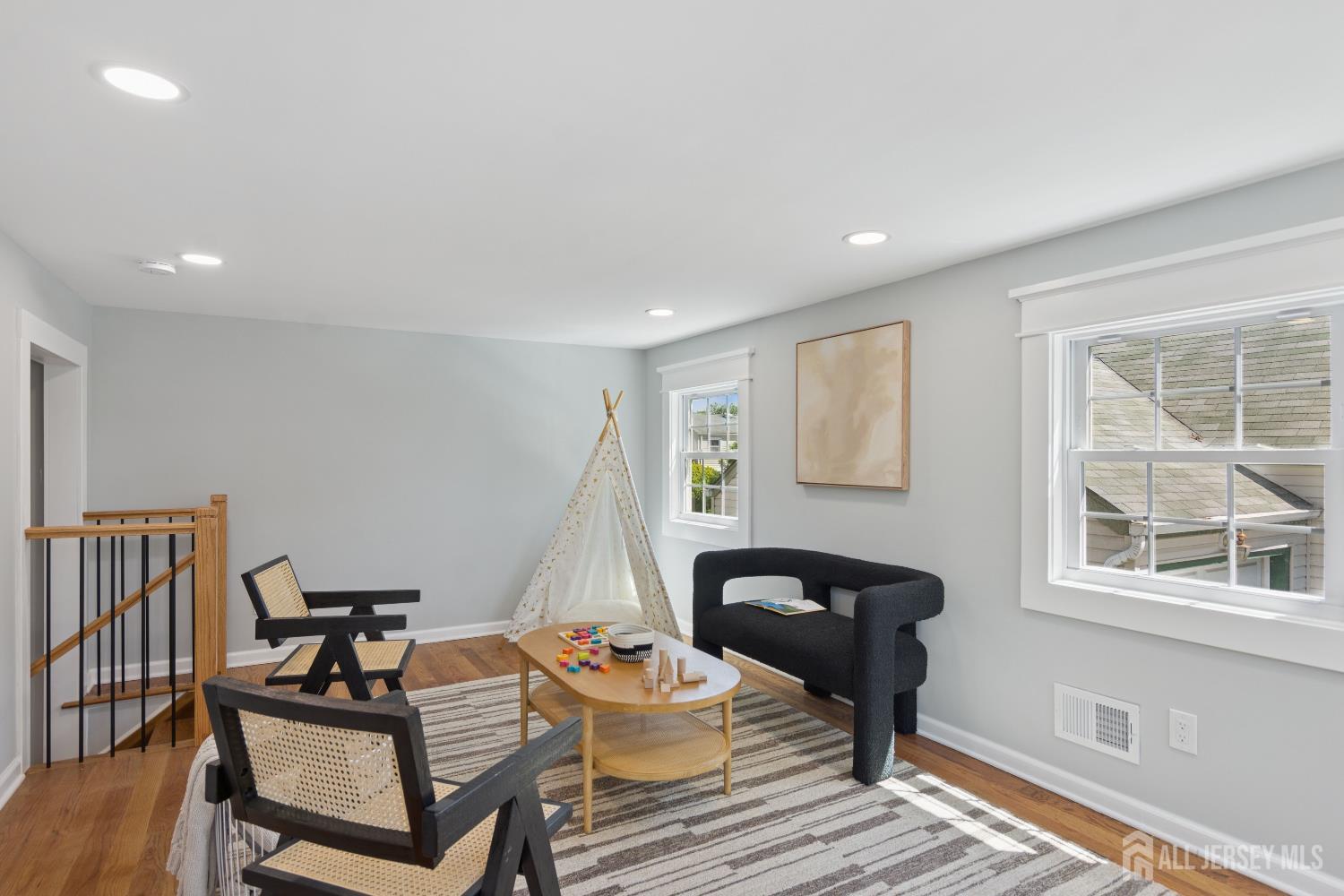 831 West Inman Avenue Rahway, NJ 07065 - Photo 11 of 35 a living room with furniture and a window
