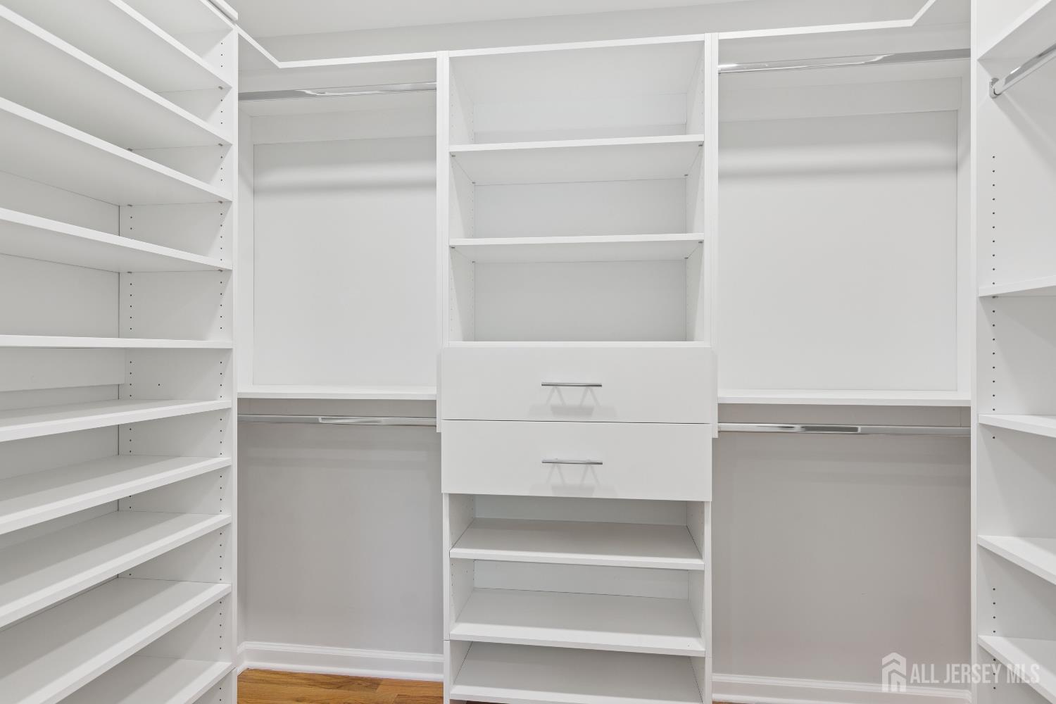 831 West Inman Avenue Rahway, NJ 07065 - Photo 23 of 35 a view of walk in closet with empty racks