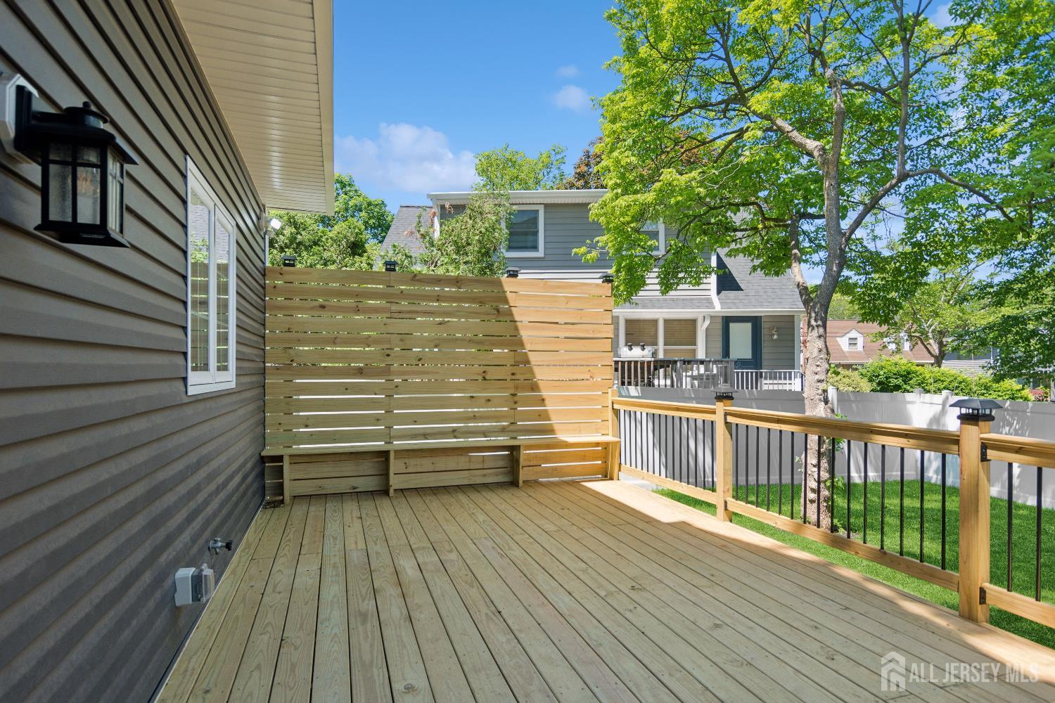831 West Inman Avenue Rahway, NJ 07065 - Photo 32 of 35 a view of a house with a deck