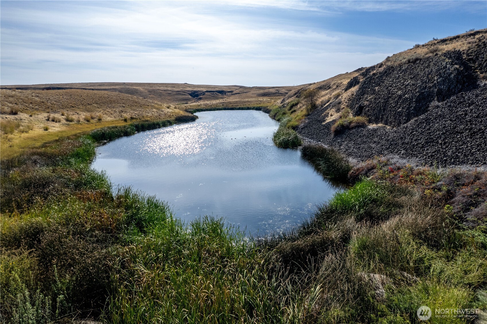 61 Dyer Hill Road Northeast Mansfield, WA 98830 - Photo 15 of 27 a view of a lake with a city