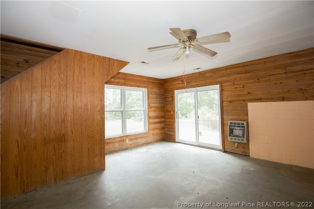 453 Heritage Farm Road Carthage, NC 28327 - Photo 11 of 50 a view of a livingroom with a ceiling fan and window