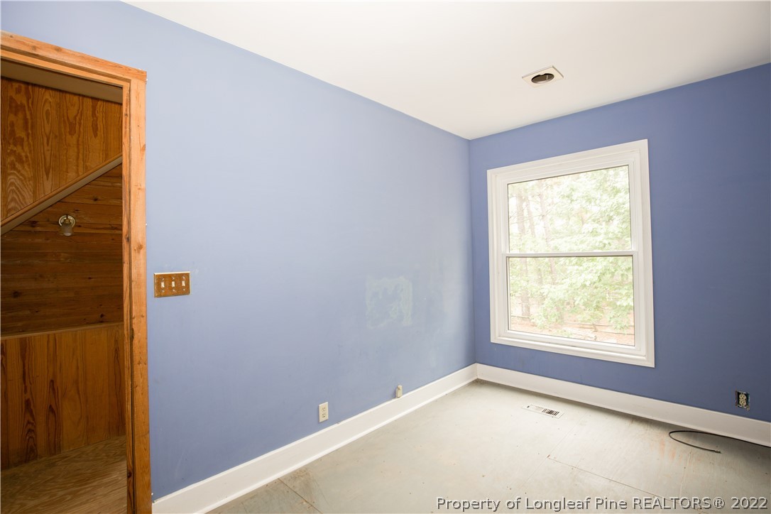 453 Heritage Farm Road Carthage, NC 28327 - Photo 18 of 50 a view of an empty room with a window