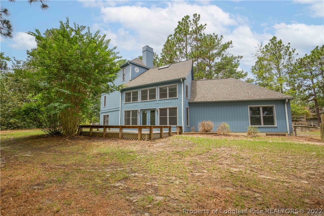 453 Heritage Farm Road Carthage, NC 28327 - Photo 2 of 50 a front view of a house with a yard