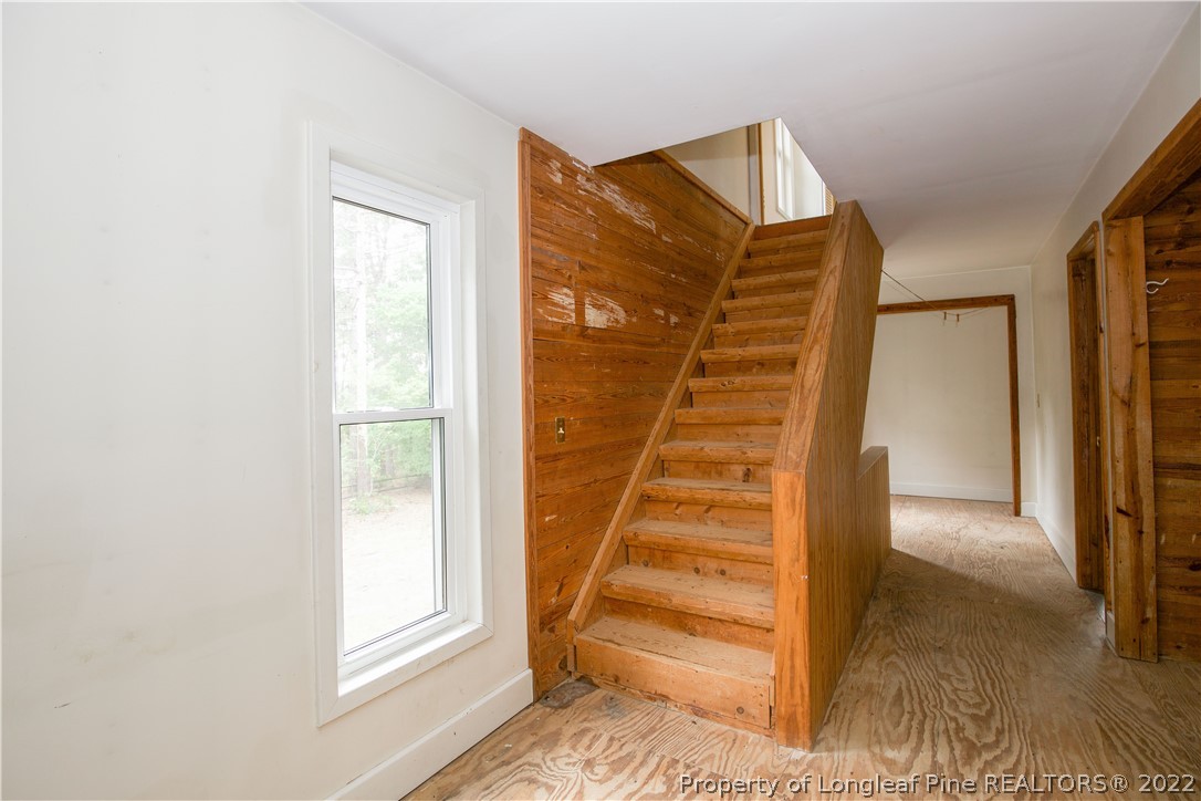453 Heritage Farm Road Carthage, NC 28327 - Photo 23 of 50 a view of entryway with stairs and wooden floor