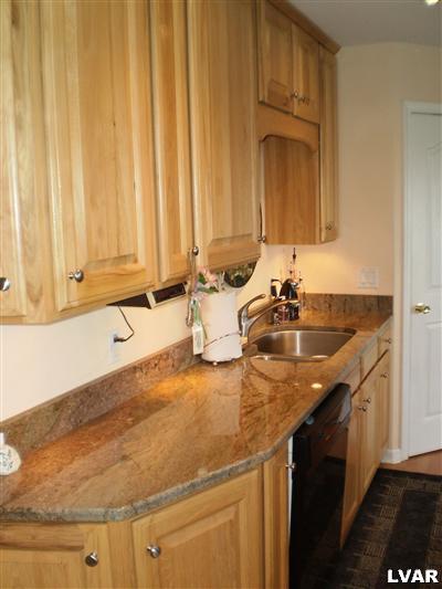 5219 Springmill Road Whitehall, PA 18052 - Photo 12 of 40 a bathroom with a sink and a mirror