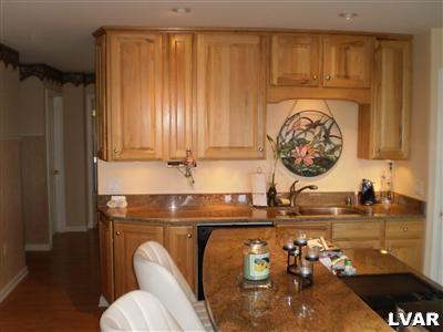 5219 Springmill Road Whitehall, PA 18052 - Photo 16 of 40 a bathroom with a sink and a mirror