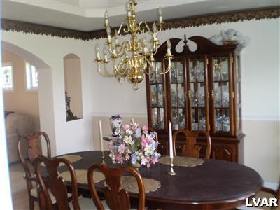 5219 Springmill Road Whitehall, PA 18052 - Photo 17 of 40 a view of a dining room with furniture and chandelier
