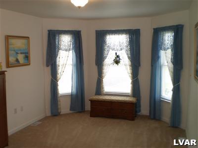 5219 Springmill Road Whitehall, PA 18052 - Photo 27 of 40 an empty room with windows and closet