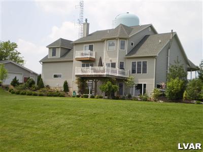 5219 Springmill Road Whitehall, PA 18052 - Photo 3 of 40 a front view of house with yard and green space