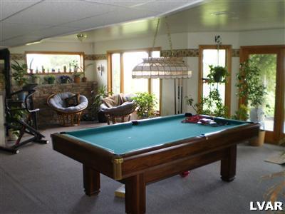 5219 Springmill Road Whitehall, PA 18052 - Photo 32 of 40 a room with pool table and windows