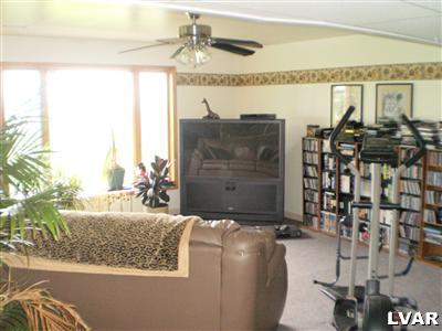 5219 Springmill Road Whitehall, PA 18052 - Photo 34 of 40 a bathroom with a granite countertop sink and a mirror