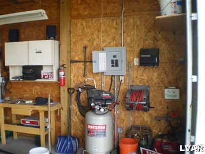 5219 Springmill Road Whitehall, PA 18052 - Photo 38 of 40 a bathroom with a sink and a mirror