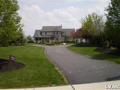 5219 Springmill Road Whitehall, PA 18052 - Photo 4 of 40 a view of a house with a big yard plants and trees