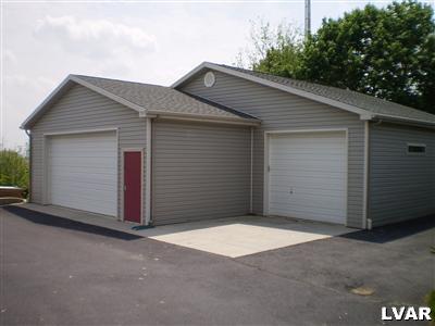 5219 Springmill Road Whitehall, PA 18052 - Photo 7 of 40 a house with a outdoor space