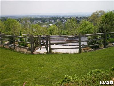 5219 Springmill Road Whitehall, PA 18052 - Photo 10 of 40 a view of a garden with houses