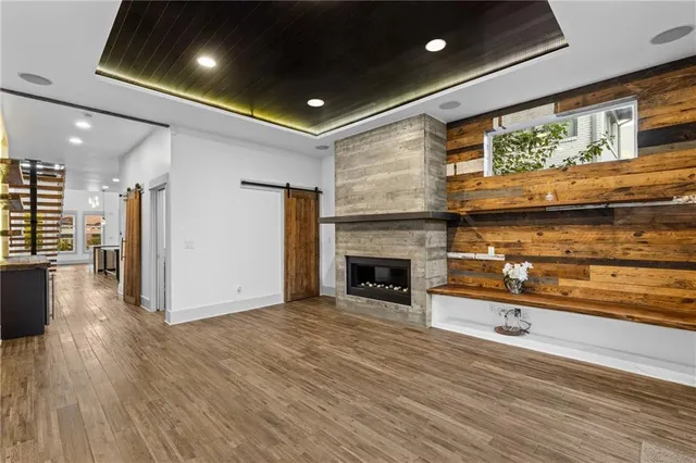 a view of kitchen with cabinets and wooden floor