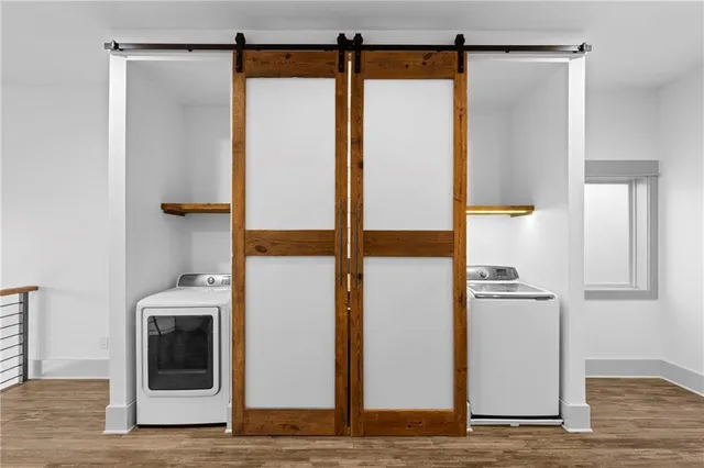 a bathroom with a shower and a mirror