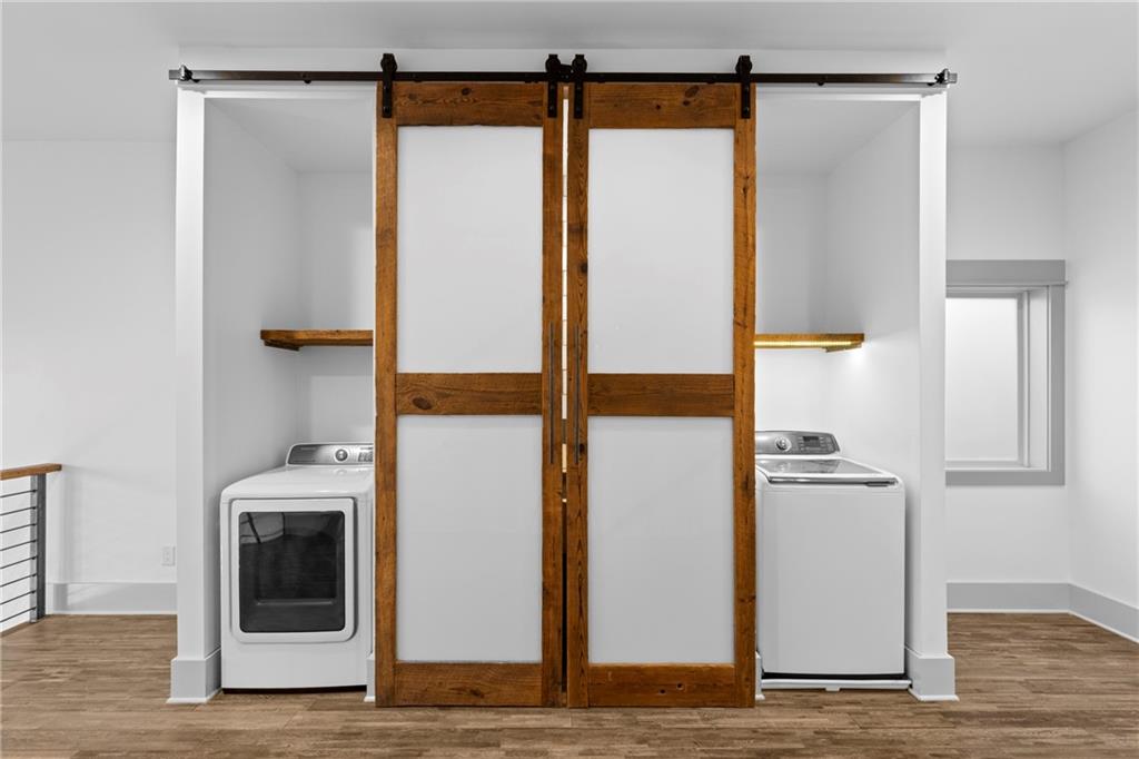 560 John Wesley Dobbs Avenue Northeast, Unit A Atlanta, GA 30312 - Photo 18 of 44 a bathroom with a shower and a mirror