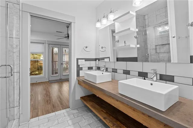 a bathroom with a sink and a mirror