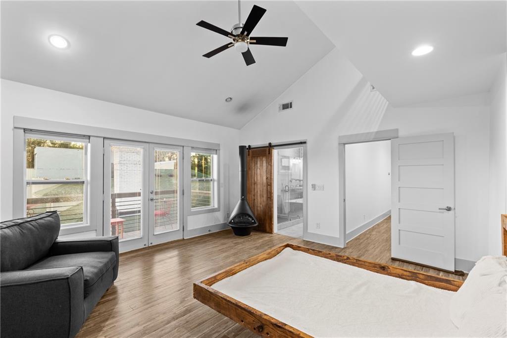560 John Wesley Dobbs Avenue Northeast, Unit A Atlanta, GA 30312 - Photo 28 of 44 a living room with furniture and wooden floor