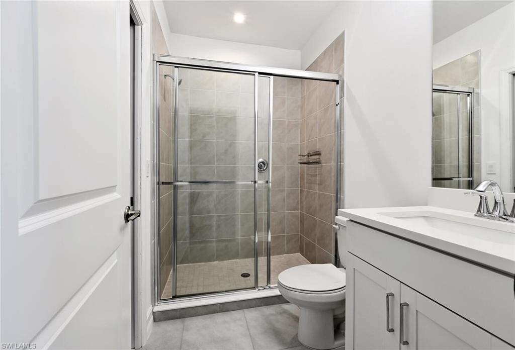 7588 Carnegie Way Naples, FL 34119 - Photo 10 of 21 Master #2 Bathroom