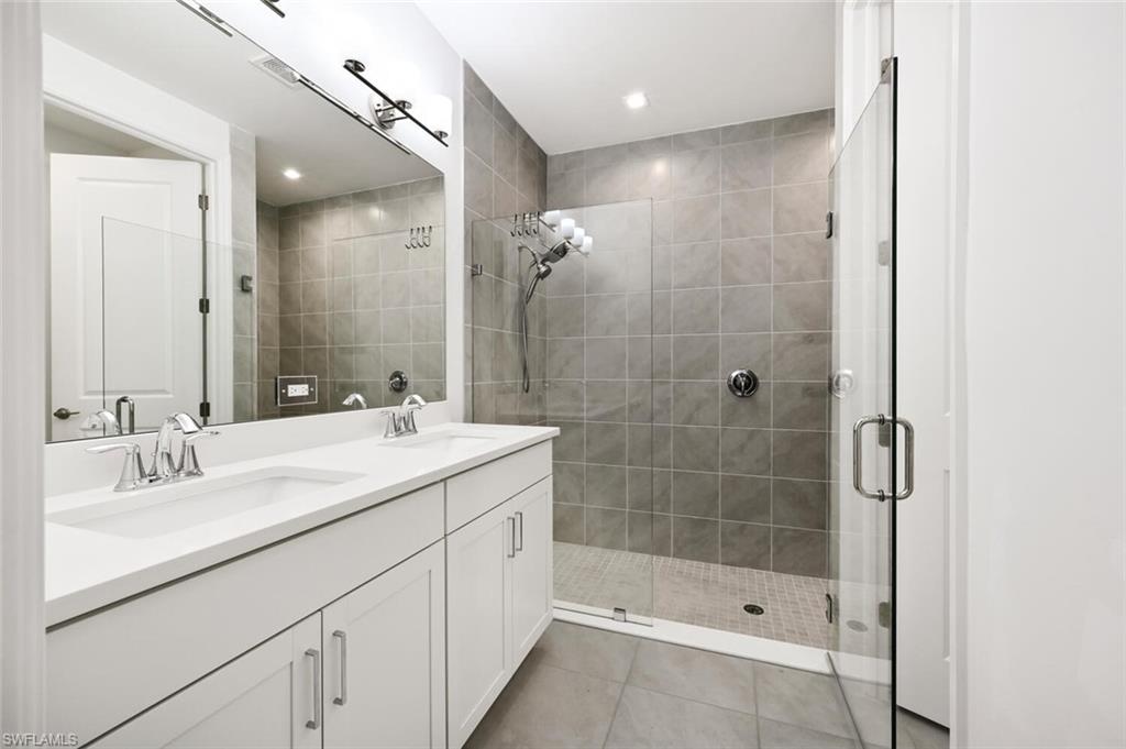 7588 Carnegie Way Naples, FL 34119 - Photo 7 of 21 Master Bathroom