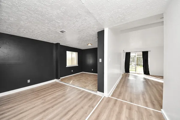 an empty room with windows