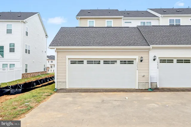 a view of a house with a garage