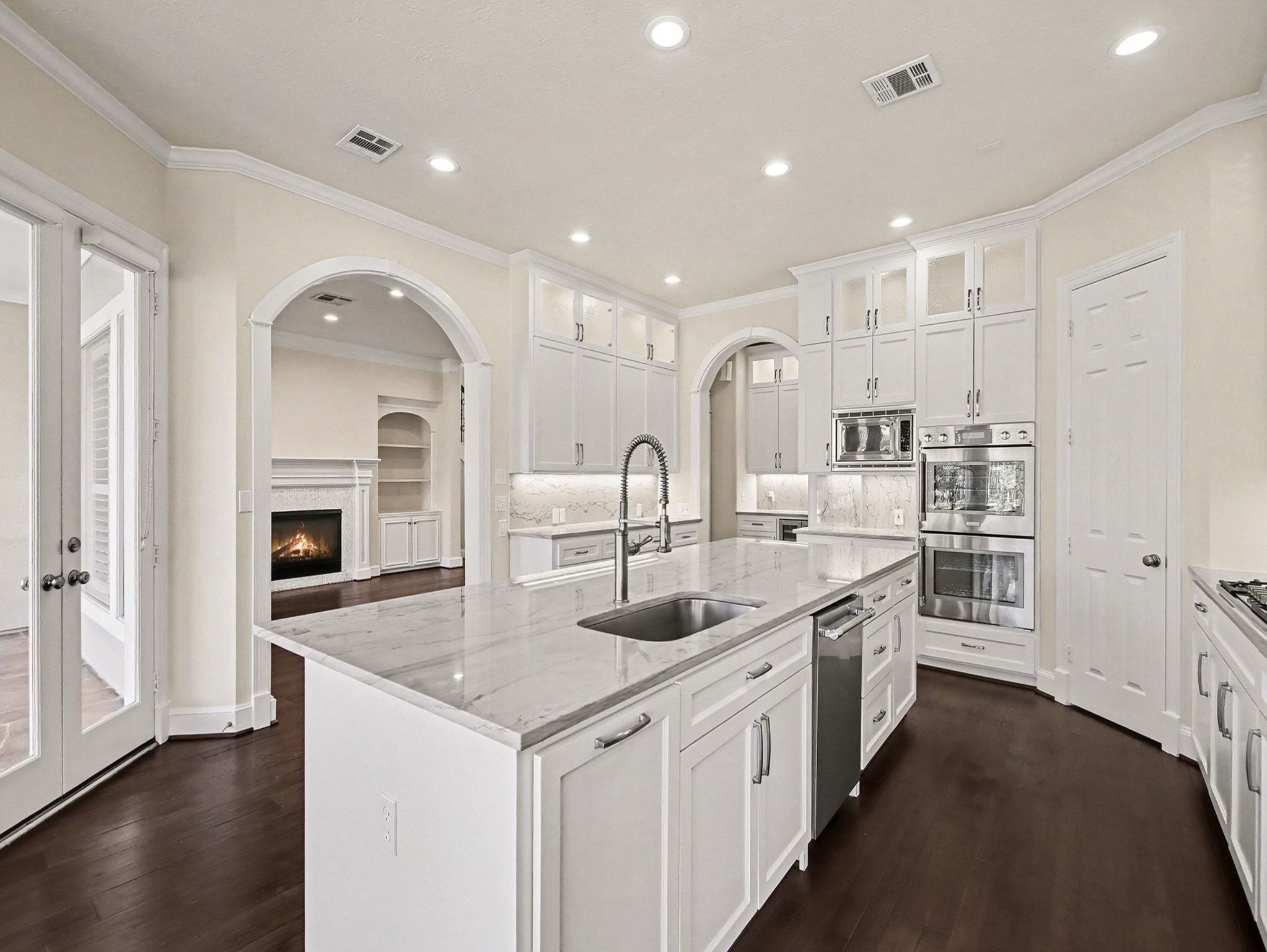 22918 Chaus Court Katy, TX 77494 - Photo 14 of 35 a kitchen with sink stove top oven and refrigerator