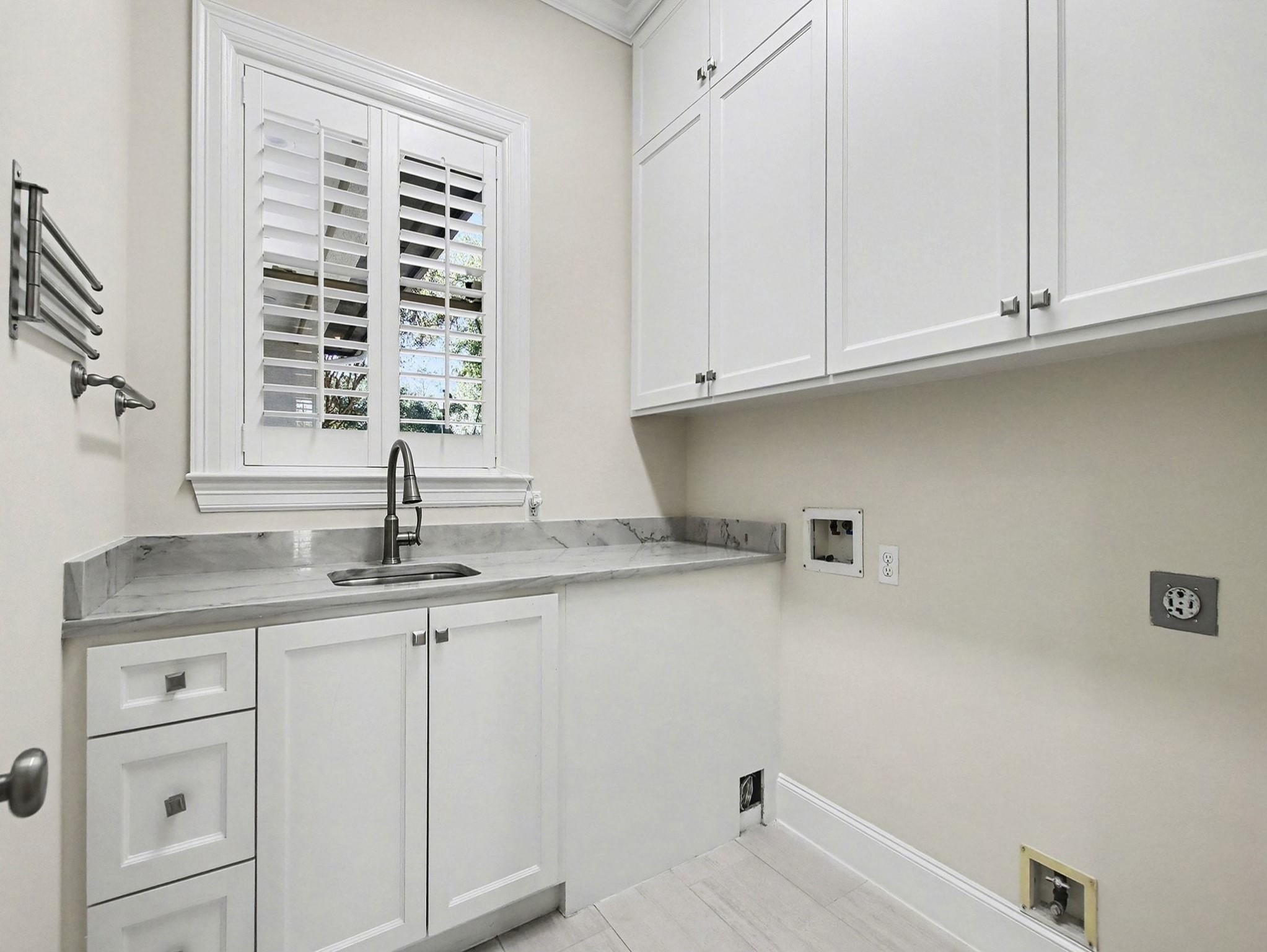 22918 Chaus Court Katy, TX 77494 - Photo 19 of 35 a kitchen with granite countertop white cabinets and a sink