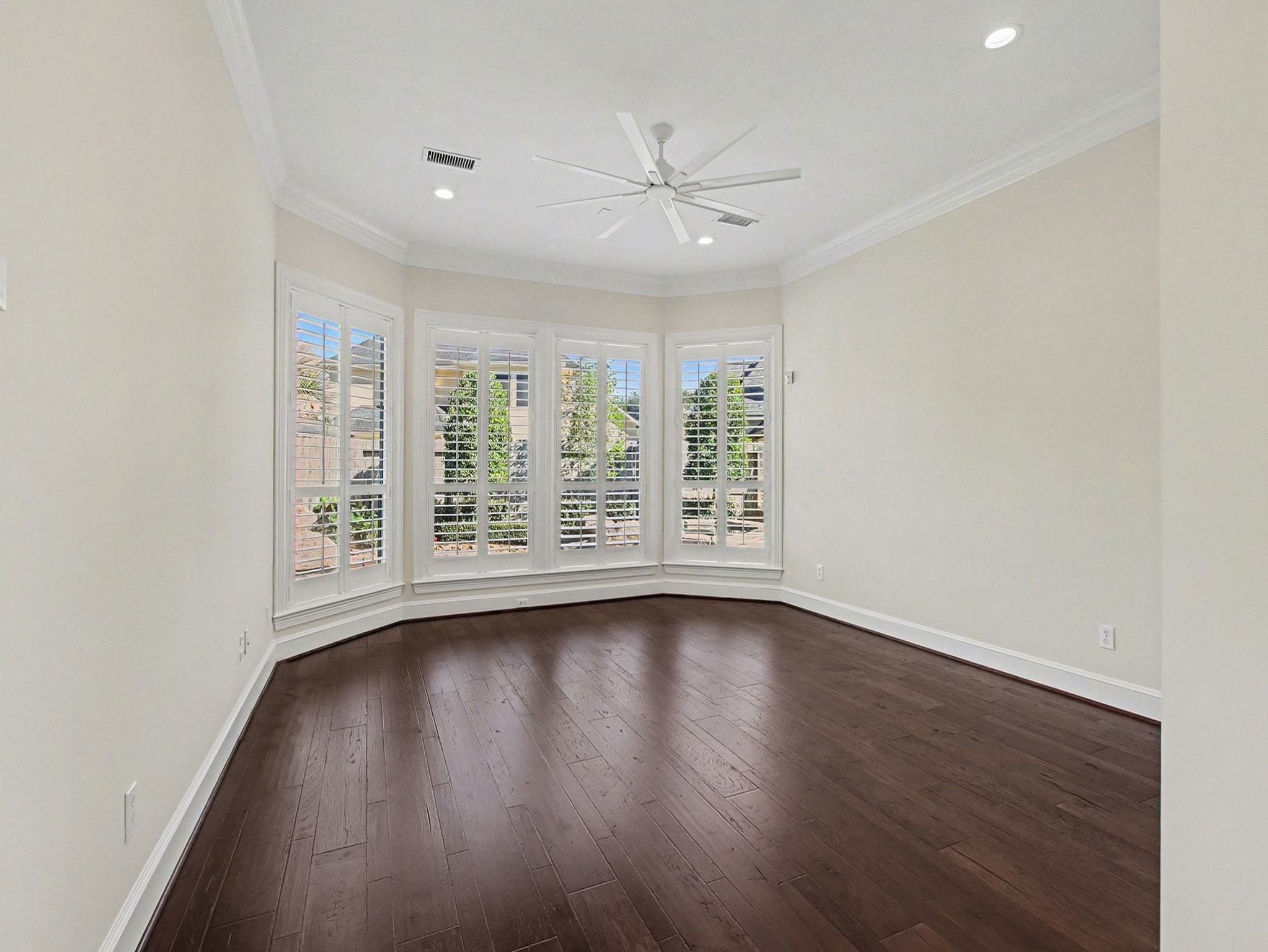 22918 Chaus Court Katy, TX 77494 - Photo 23 of 35 an empty room with wooden floor and windows