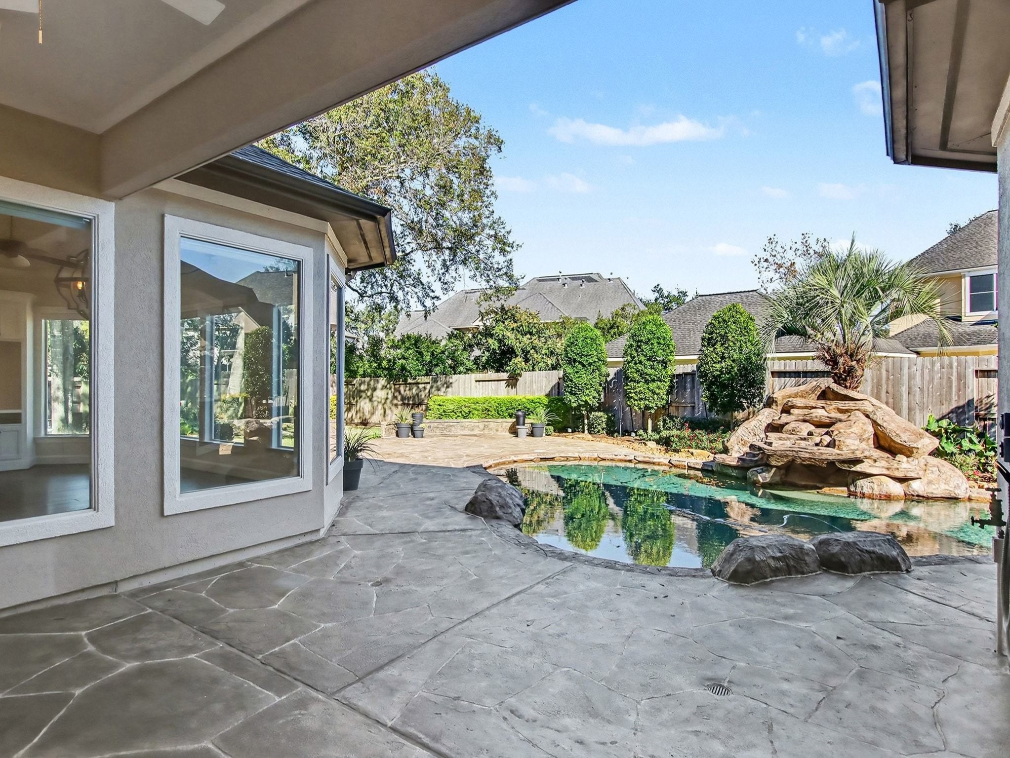 22918 Chaus Court Katy, TX 77494 - Photo 31 of 35 a view of backyard with outdoor seating and plants