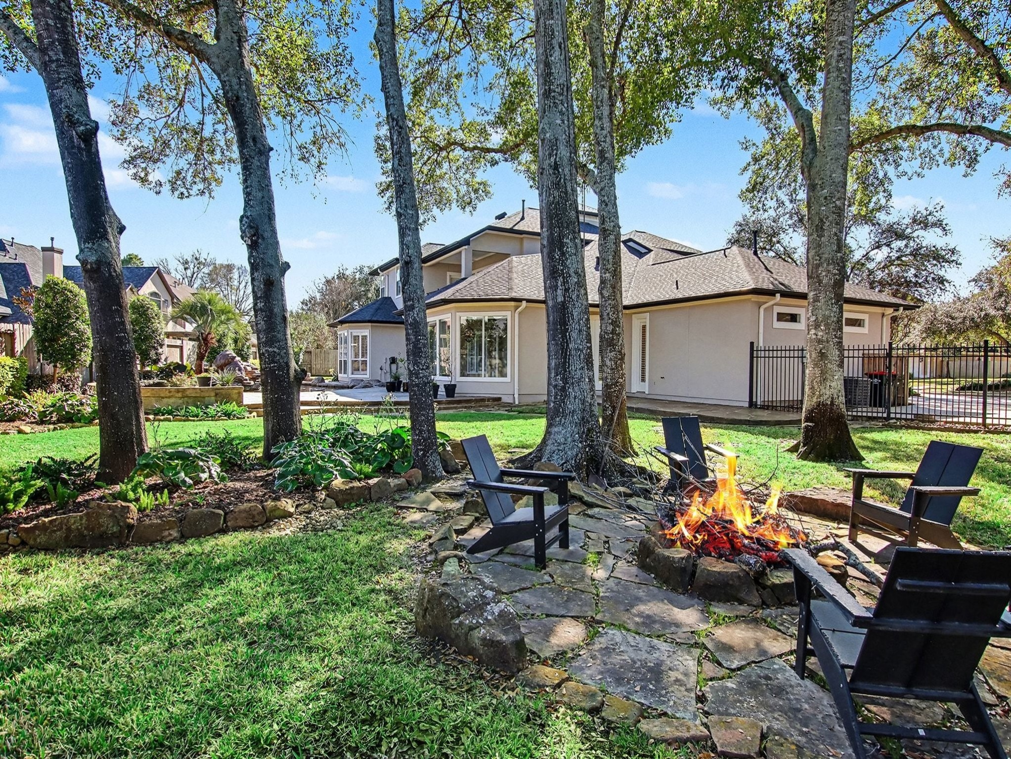 22918 Chaus Court Katy, TX 77494 - Photo 35 of 35 a view of a chairs and table in a backyard