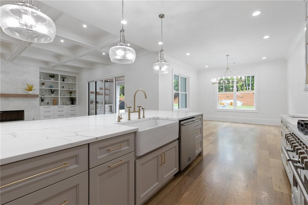 461 Harry McCarty Road Bethlehem, GA 30620 - Photo 19 of 78 a large kitchen with kitchen island a large island in the center and stainless steel appliances