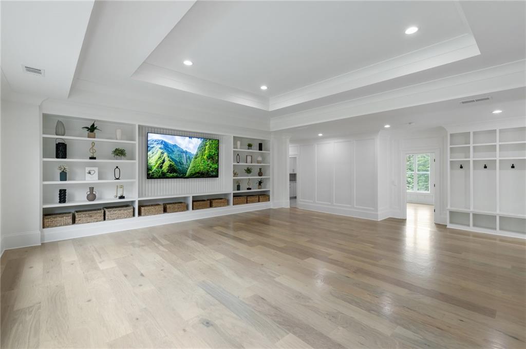 461 Harry McCarty Road Bethlehem, GA 30620 - Photo 35 of 78 a view of an empty room with wooden floor and windows